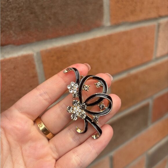 Vintage Gold-tone brooch with black enamel swirl design & floral rhinestones - Picture 2 of 5